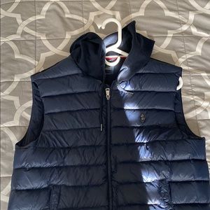 I am selling a Polo Vest it is mostly Navy Blue with red and white at the bottom